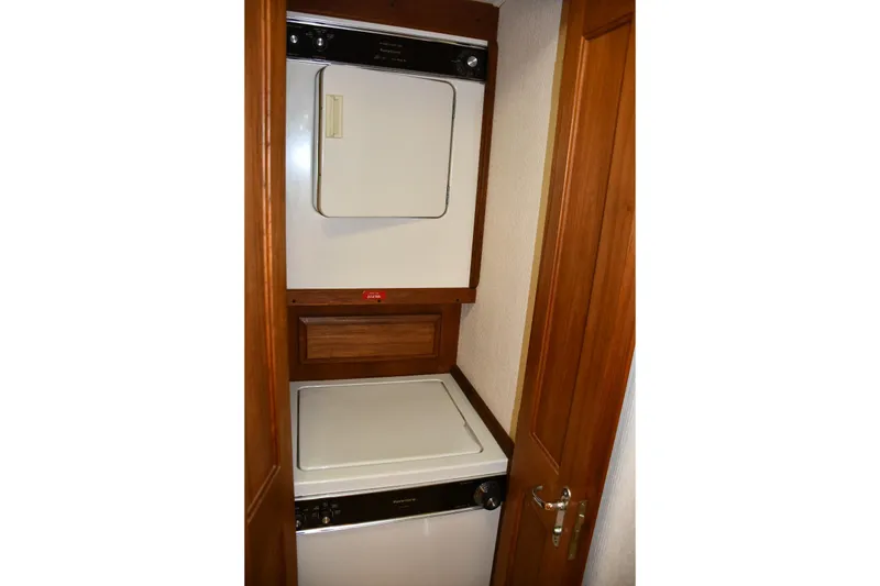 Slide: The Image of Stacked washer and dryer in 1990 Viking 53 Convertible yacht. - 15