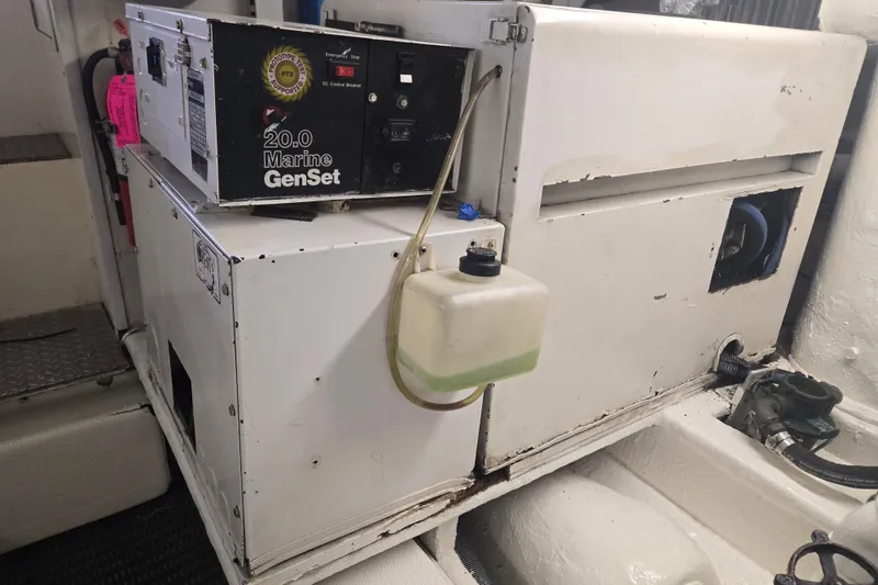 Slide: The Image of 1990 Viking 53 Convertible marine generator set in engine room. - 28