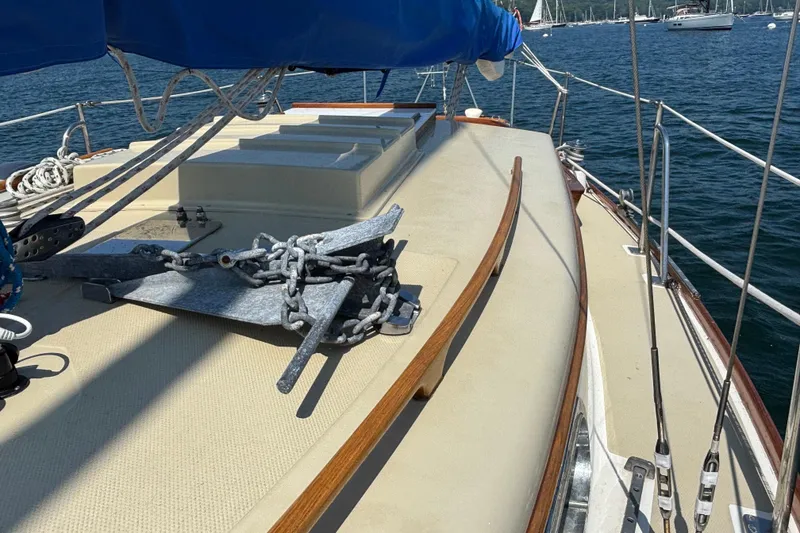 Slide: The Image of Deck of 1998 Hank Hinckley Great Harbor 26 sailboat with anchor and ropes. - 10