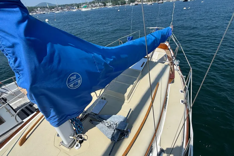 Slide: The Image of Sailboat deck view of 1998 Hank Hinckley Great Harbor 26 with blue sail cover. - 13