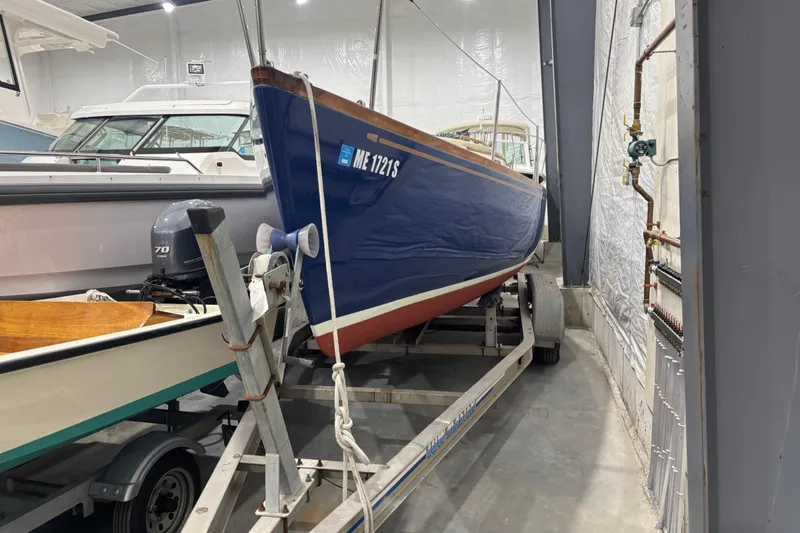 Slide: The Image of 1998 Hank Hinckley Great Harbor 26 boat on trailer in storage facility. - 25