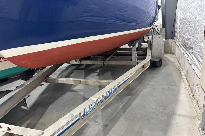 Slide: The Image of 1998 Hank Hinckley Great Harbor 26 boat on trailer in storage facility. - 26