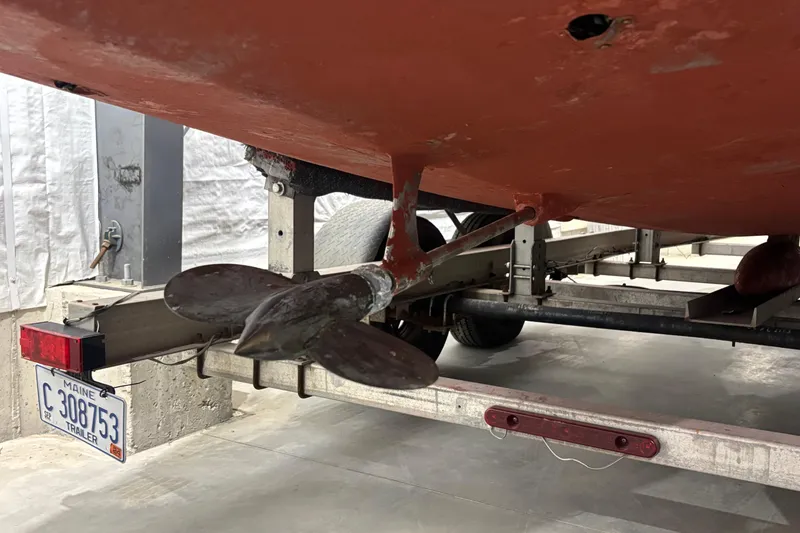 Slide: The Image of Propeller and trailer of 1998 Hank Hinckley Great Harbor 26 boat in storage. - 27
