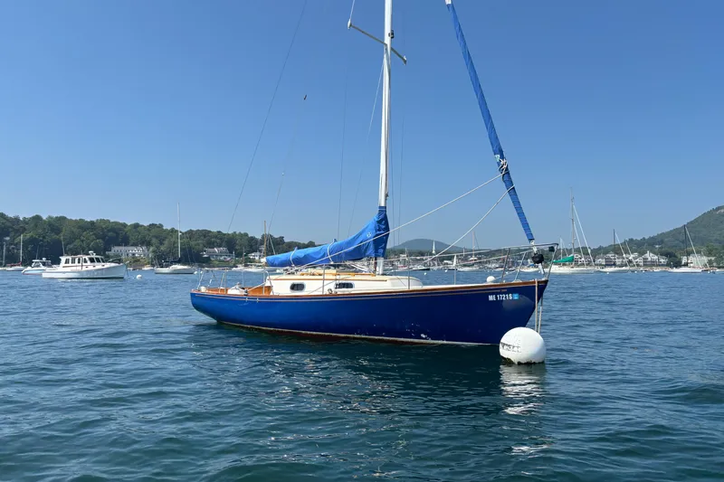 Slide: The Image of Sailboat "Hank Hinckley Great Harbor 26" from 1998 anchored in a scenic harbor. - 4