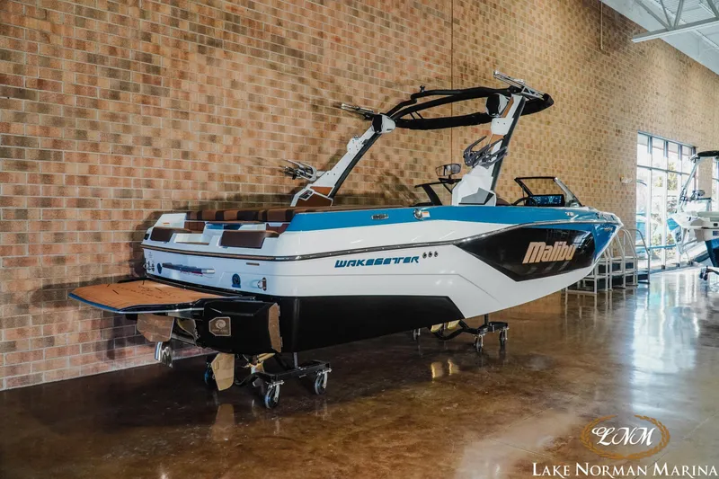 Slide: The Image of 2026 Malibu Wakesetter 21 LX boat displayed at Lake Norman Marina. - 3