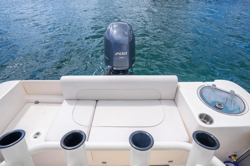 Slide: The Image of 2025 Sea Born LX22 Center Console boat with Yamaha 200 engine on water. - 35