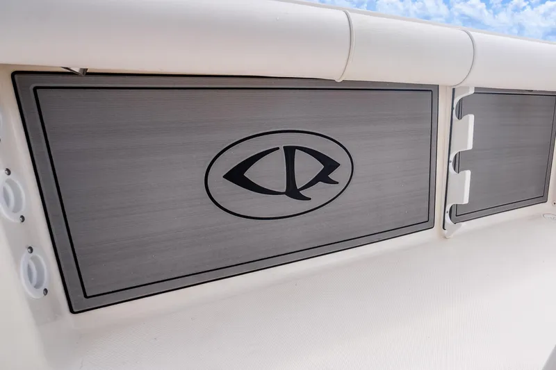 Slide: The Image of 2025 Sea Born LX22 Center Console boat detail with logo on side panel. - 38