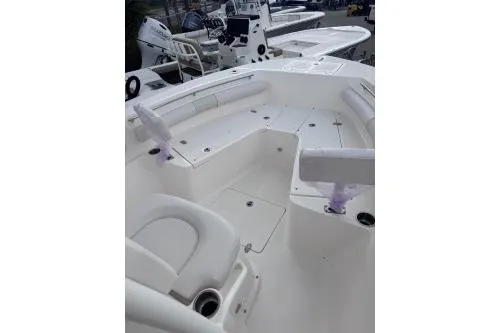 Slide: The Image of 2025 Sea Born LX22 Center Console boat interior with seating and storage. - 7