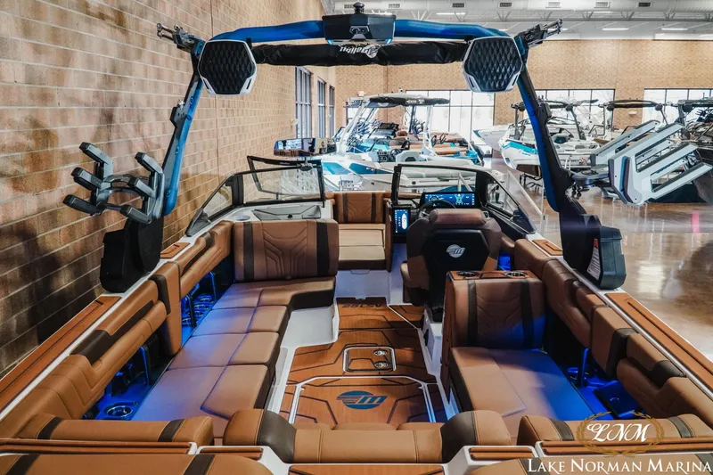 Slide: The Image of 2026 Malibu Wakesetter 25 LSV boat interior with luxurious seating and modern design at Lake Norman Marina. - 8