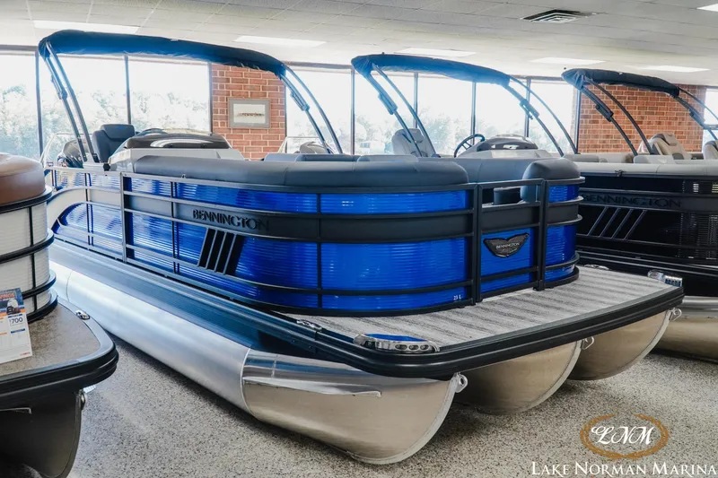 The Image of 2026 Bennington 23LSB pontoon boat displayed at Lake Norman Marina showroom. - 1