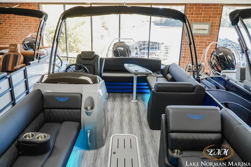 Slide: The Image of 2026 Bennington 23LSB pontoon boat interior with luxurious seating at Lake Norman Marina. - 17