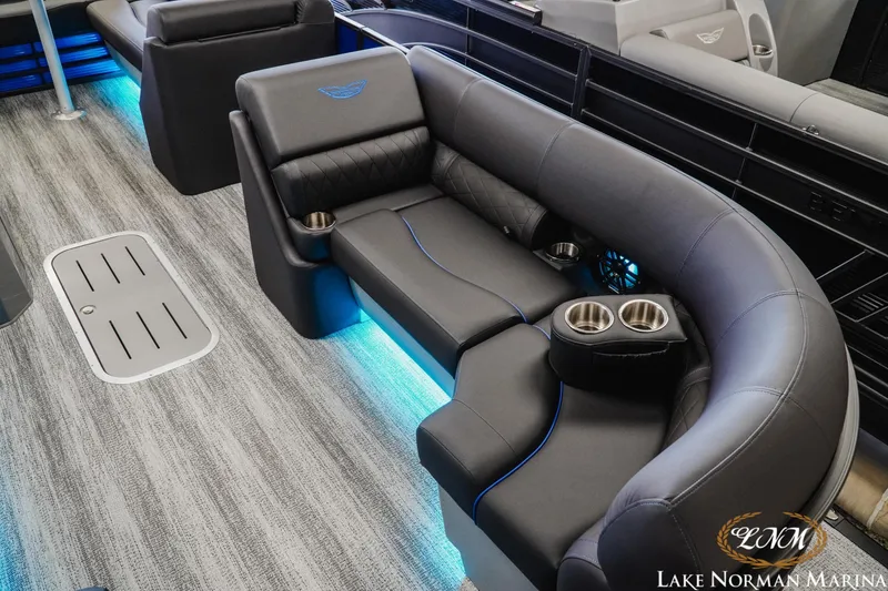 Slide: The Image of Luxurious interior of 2026 Bennington 23LSB pontoon boat with LED lighting and cup holders. - 20