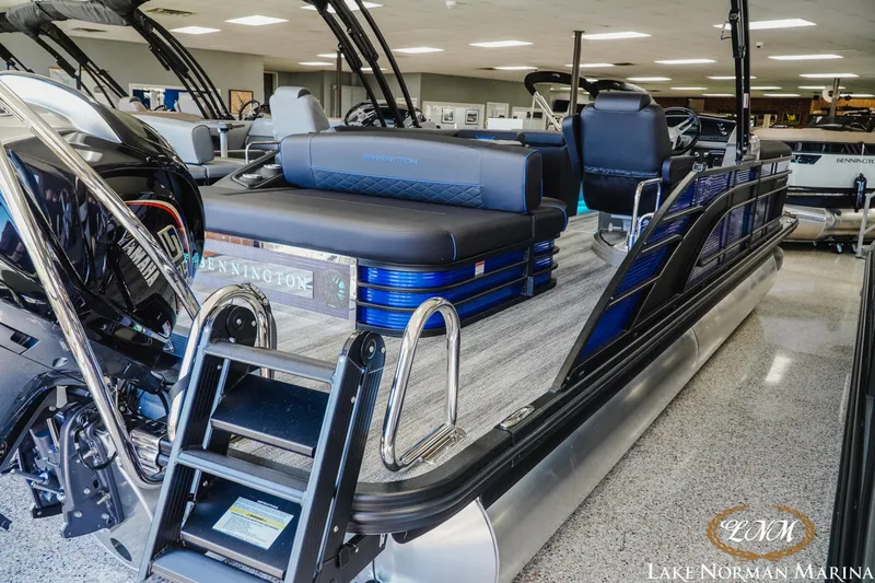 Slide: The Image of 2026 Bennington 23LSB pontoon boat with Yamaha engine at Lake Norman Marina. - 4