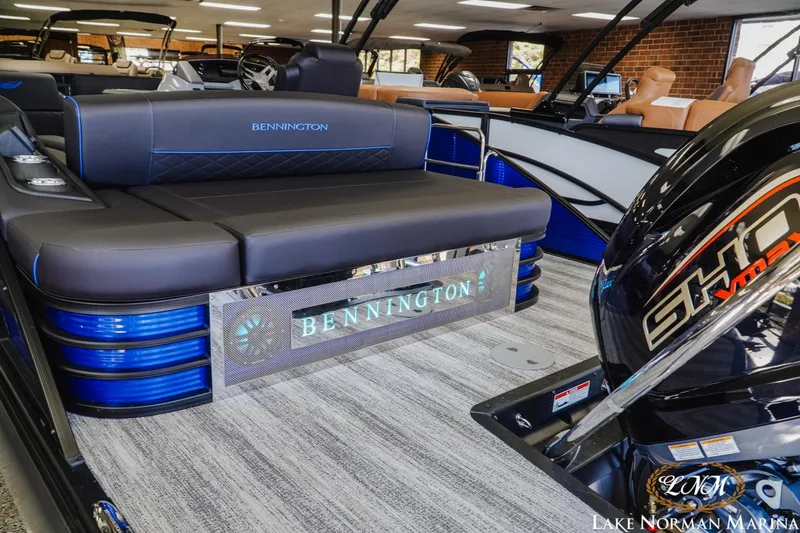 Slide: The Image of 2026 Bennington 23LSB pontoon boat interior with Yamaha SHO engine at Lake Norman Marina. - 5