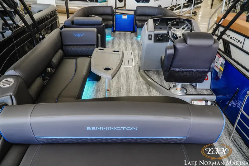 Slide: The Image of 2026 Bennington 23LSB pontoon boat interior with luxurious seating and modern helm. - 6
