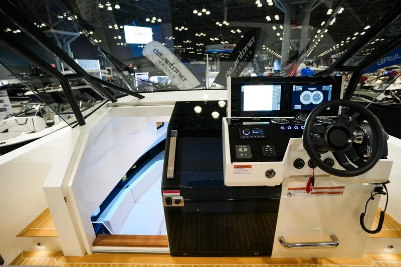 Slide: The Image of Cockpit of De Antonio Yachts D36, 2026 model, featuring modern controls. - 17