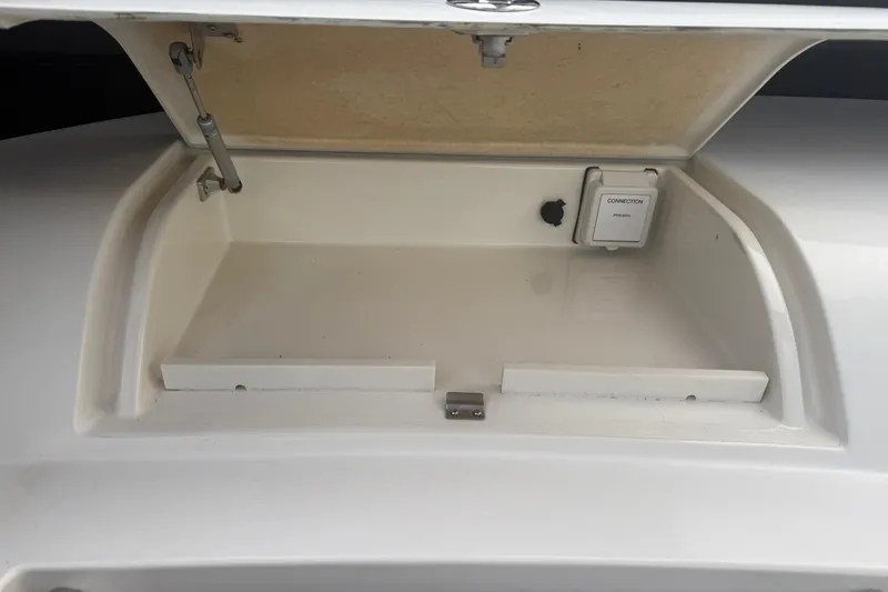 Slide: The Image of Open storage compartment on a 2009 Carver 44 Sojourn boat. - 28
