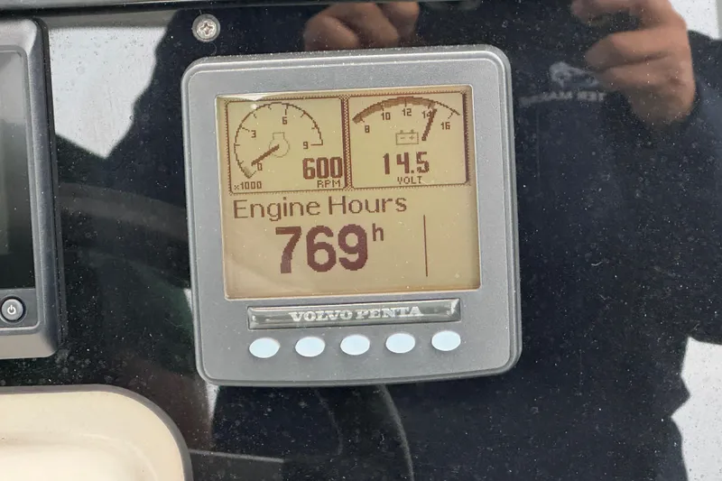 Slide: The Image of Volvo Penta engine display showing 769 hours on a 2009 Carver 44 Sojourn. - 12