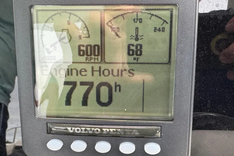 Slide: The Image of Volvo Penta engine display showing 770 hours on a 2009 Carver 44 Sojourn. - 13