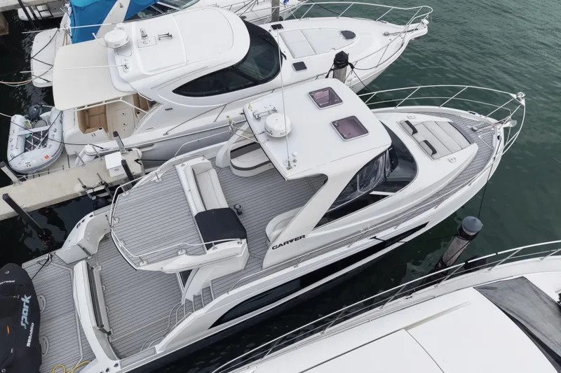 Slide: The Image of 2009 Carver 44 Sojourn yacht docked at marina, aerial view. - 7