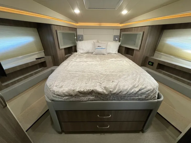 Slide: The Image of Luxurious bedroom interior of 2022 Regal 42 FXO yacht with modern design. - 16