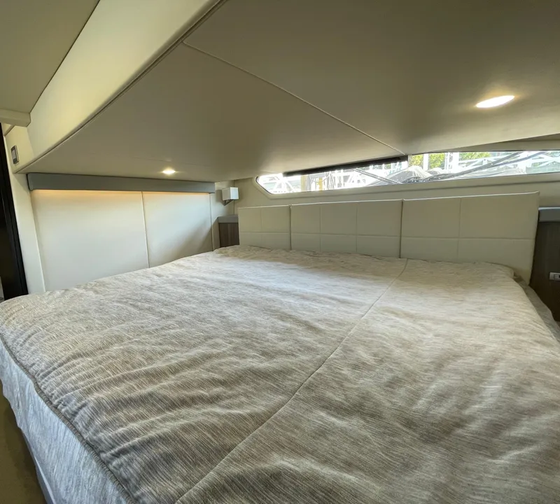 Slide: The Image of Luxurious bedroom interior of 2022 Regal 42 FXO yacht with modern design. - 26