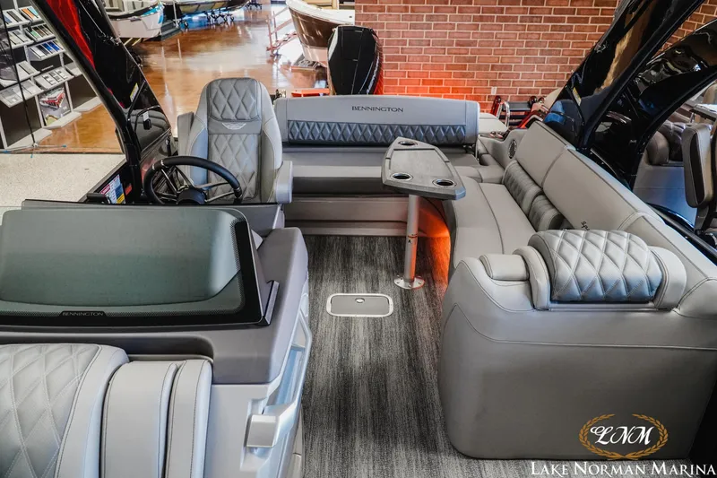 Slide: The Image of Luxurious interior of 2026 Bennington 25QSBA pontoon boat at Lake Norman Marina. - 15