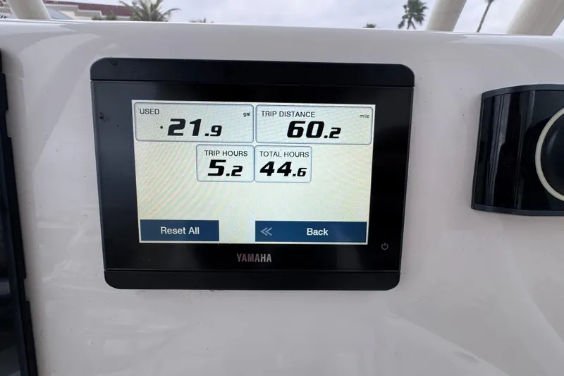 Slide: The Image of Yamaha display on 2024 Key West 250 Bay Reef showing trip data: fuel, distance, hours. - 16