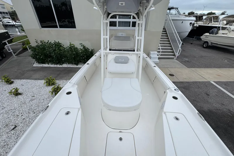 Slide: The Image of 2024 Key West 250 Bay Reef boat interior, featuring spacious seating and modern design. - 9