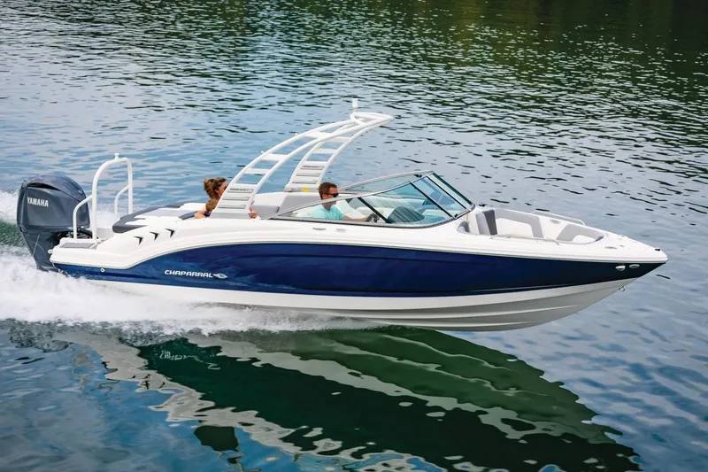 The Image of Manufacturer Provided Image: 2026 Chaparral 23 SSi OB boat cruising on a calm lake. - 0