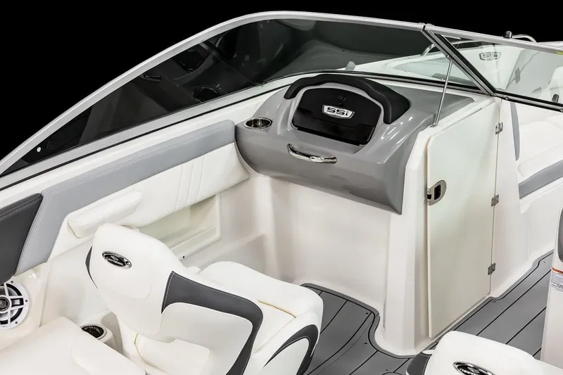 Slide: The Image of Manufacturer Provided Image: 2025 Chaparral 23 SSi OB boat interior with sleek seating and modern dashboard design. - 13