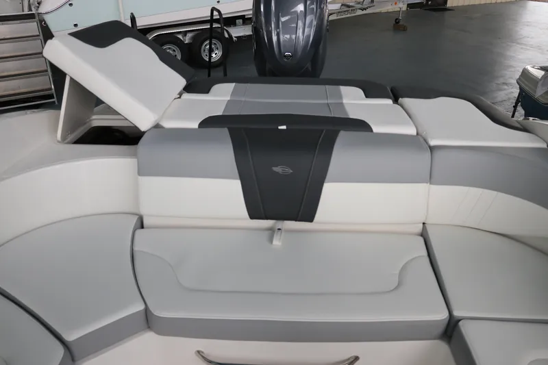 Slide: The Image of 2026 Chaparral 23 SSi OB boat interior with gray and white seating. - 20