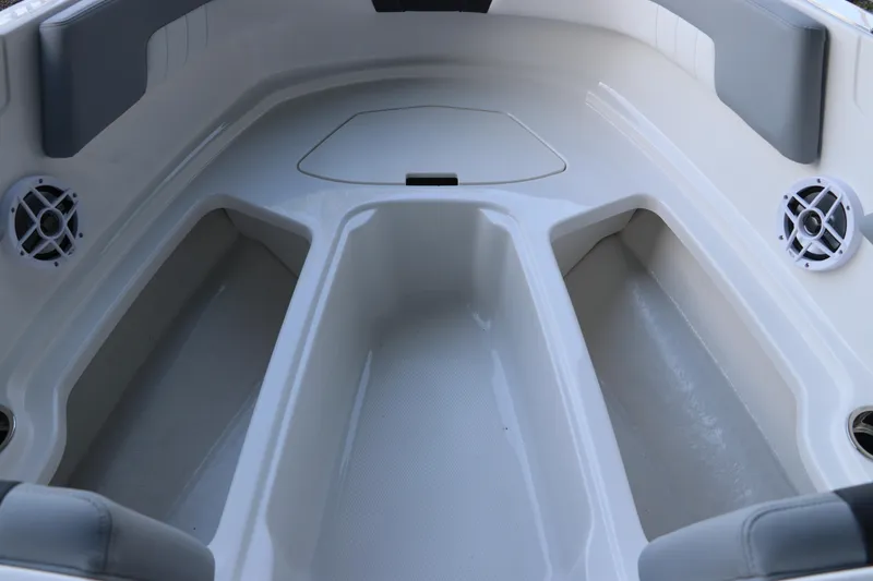 Slide: The Image of 2026 Chaparral 23 SSi OB boat interior with seating and speakers. - 42
