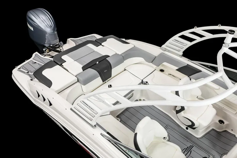 Slide: The Image of Manufacturer Provided Image: 2025 Chaparral 23 SSi OB boat interior with Yamaha outboard motor, featuring sleek seating and design. - 8
