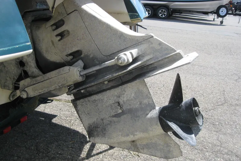 Slide: The Image of 1997 Regal 2100 LSR boat propeller and outdrive close-up. - 7