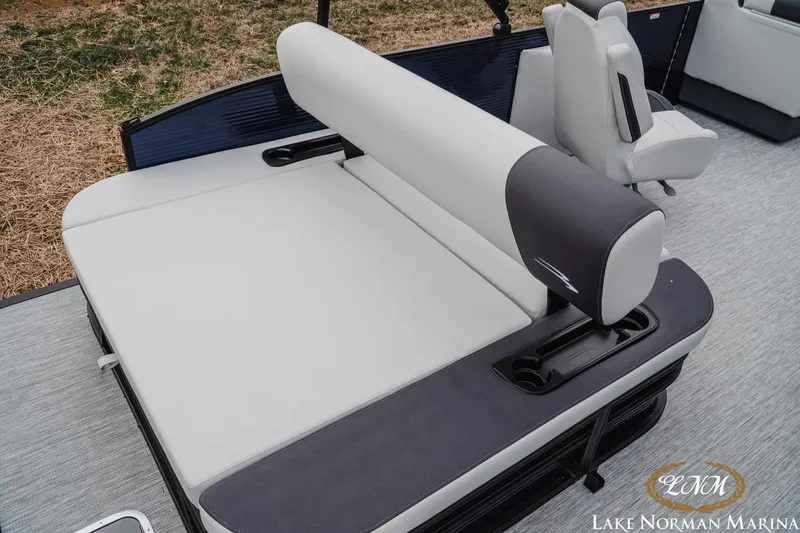 Slide: The Image of 2026 Bennington 22SSB SNAP boat interior with comfortable seating and cup holders. - 10