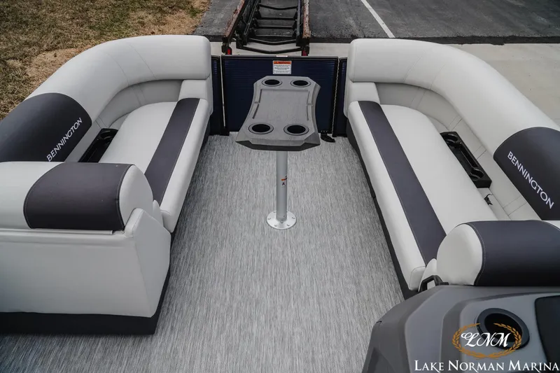 Slide: The Image of 2026 Bennington 22SSB SNAP pontoon boat interior with gray seating and table. - 15