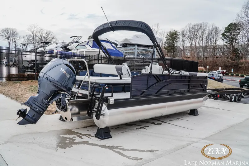 Slide: The Image of 2026 Bennington 22SSB SNAP pontoon boat with Yamaha engine at Lake Norman Marina. - 3