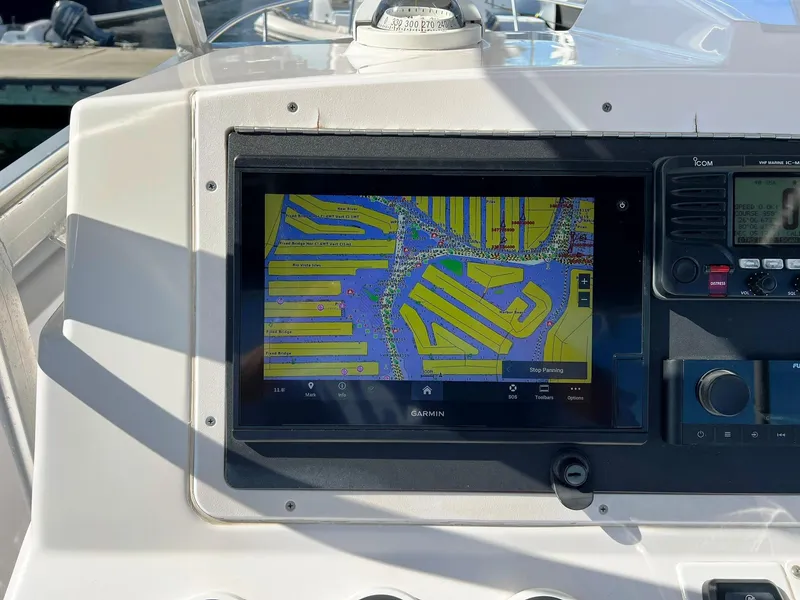 Slide: The Image of Navigation system on 2004 Donzi 35 ZF Cuddy boat dashboard. - 24