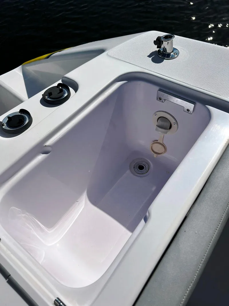 Slide: The Image of 2004 Donzi 35 ZF Cuddy boat interior compartment detail. - 32