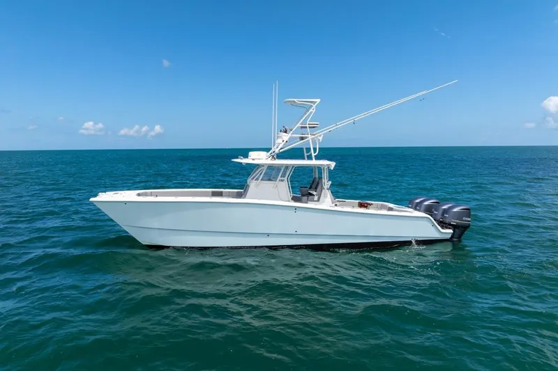The Image of 2018 Freeman 37VH boat on open sea under clear blue sky. - 0