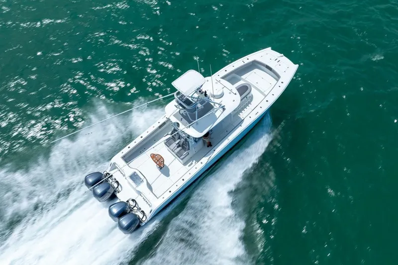 Slide: The Image of 2018 Freeman 37VH boat cruising on open water, aerial view. - 16
