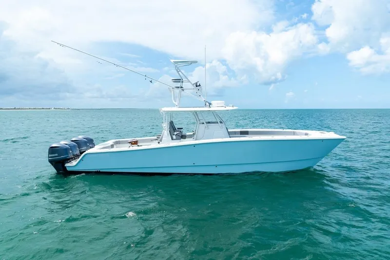 Slide: The Image of 2018 Freeman 37VH boat on open sea with clear skies. - 2