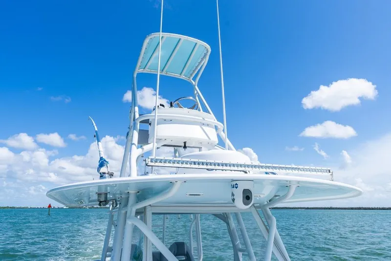 Slide: The Image of Freeman 37VH 2018 boat on water under clear blue sky. - 24
