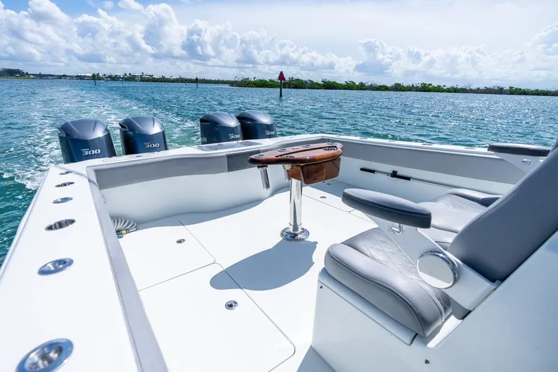 Slide: The Image of Freeman 37VH 2018 boat interior with quad 300 engines on open water. - 38