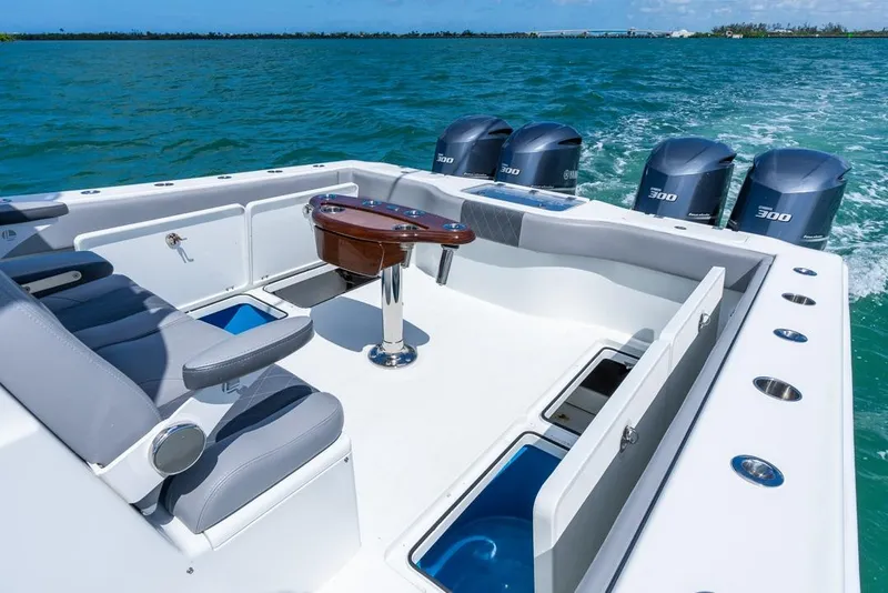 Slide: The Image of Freeman 37VH 2018 boat with four Yamaha 300 engines on open water. - 39