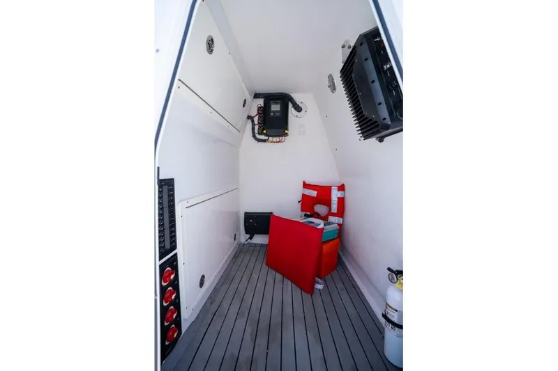Slide: The Image of Interior of 2018 Freeman 37VH boat with safety equipment and control panels. - 49
