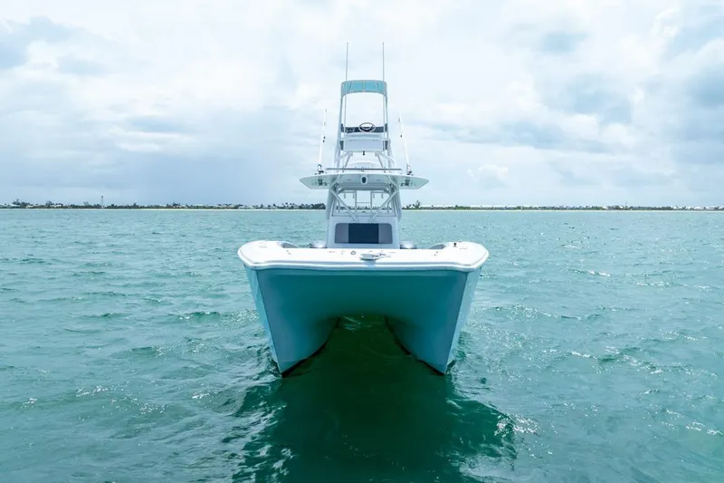 Slide: The Image of 2018 Freeman 37VH boat on open water under cloudy sky. - 5