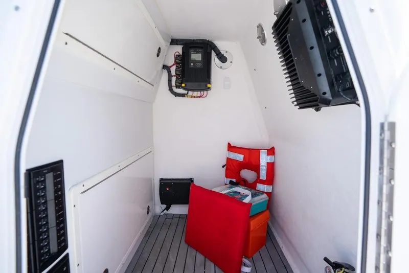 Slide: The Image of Interior of a 2018 Freeman 37VH boat, featuring safety equipment and electrical panel. - 50
