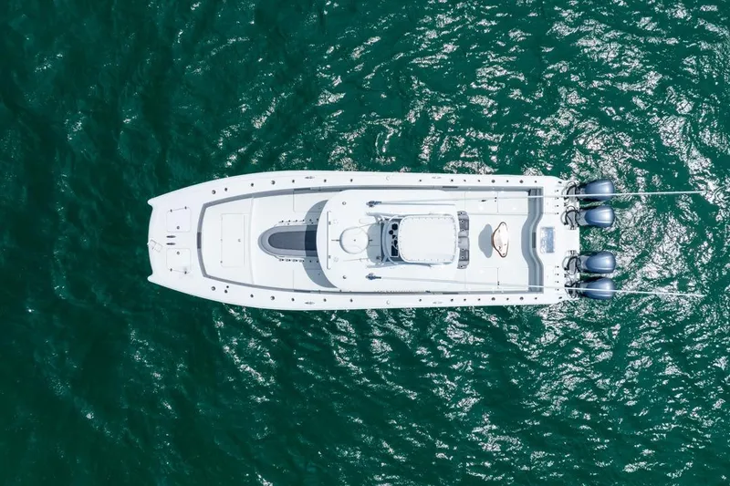Slide: The Image of Aerial view of 2018 Freeman 37VH boat on turquoise water. - 6